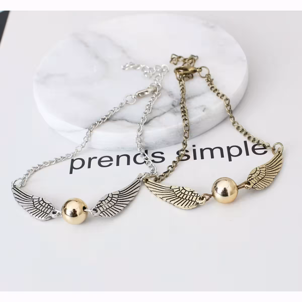 Elegantti kultainen rannekoru Snitch-riipuksella, sarjan fanille