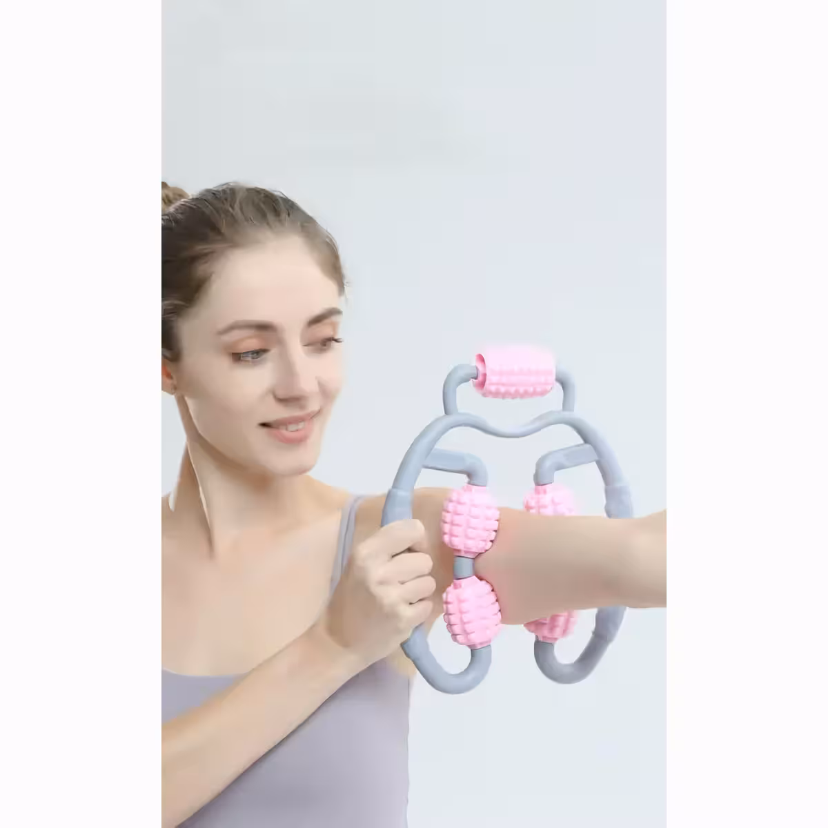 Käsin käytettävä lihashierontalaite väsymyksen vähentämiseen