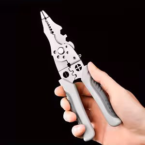 Sähköasentajan monitoimipuristimen etunäkymä kaapeleille